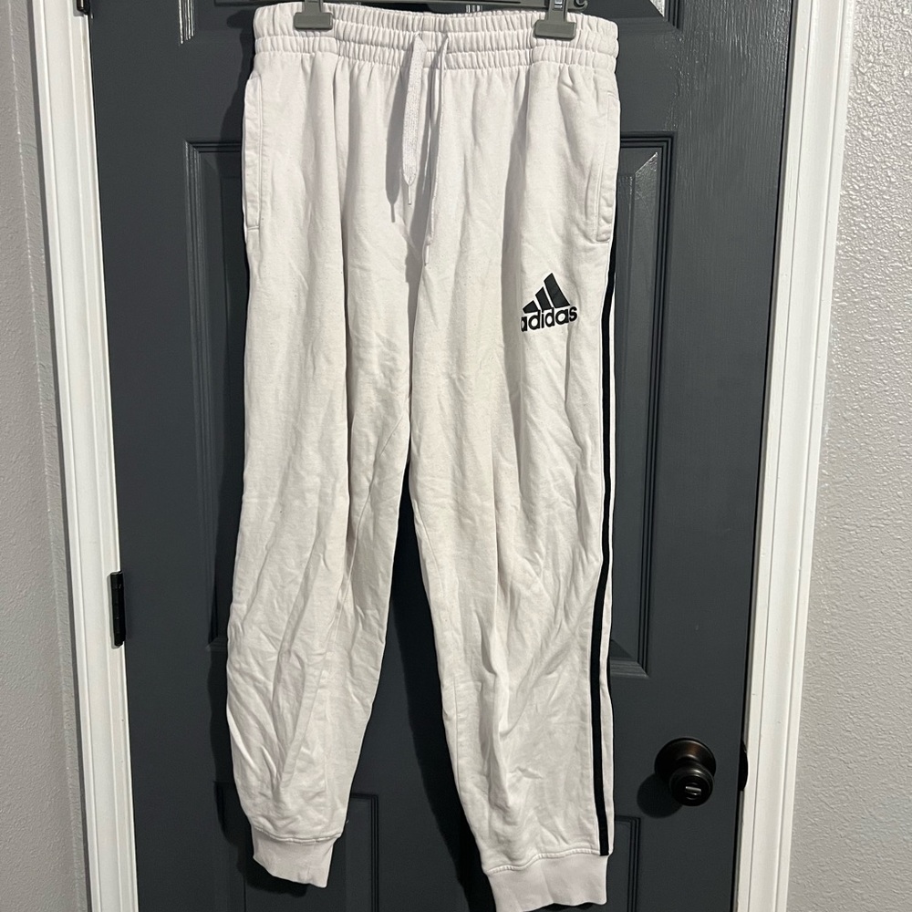 White adidas track pants